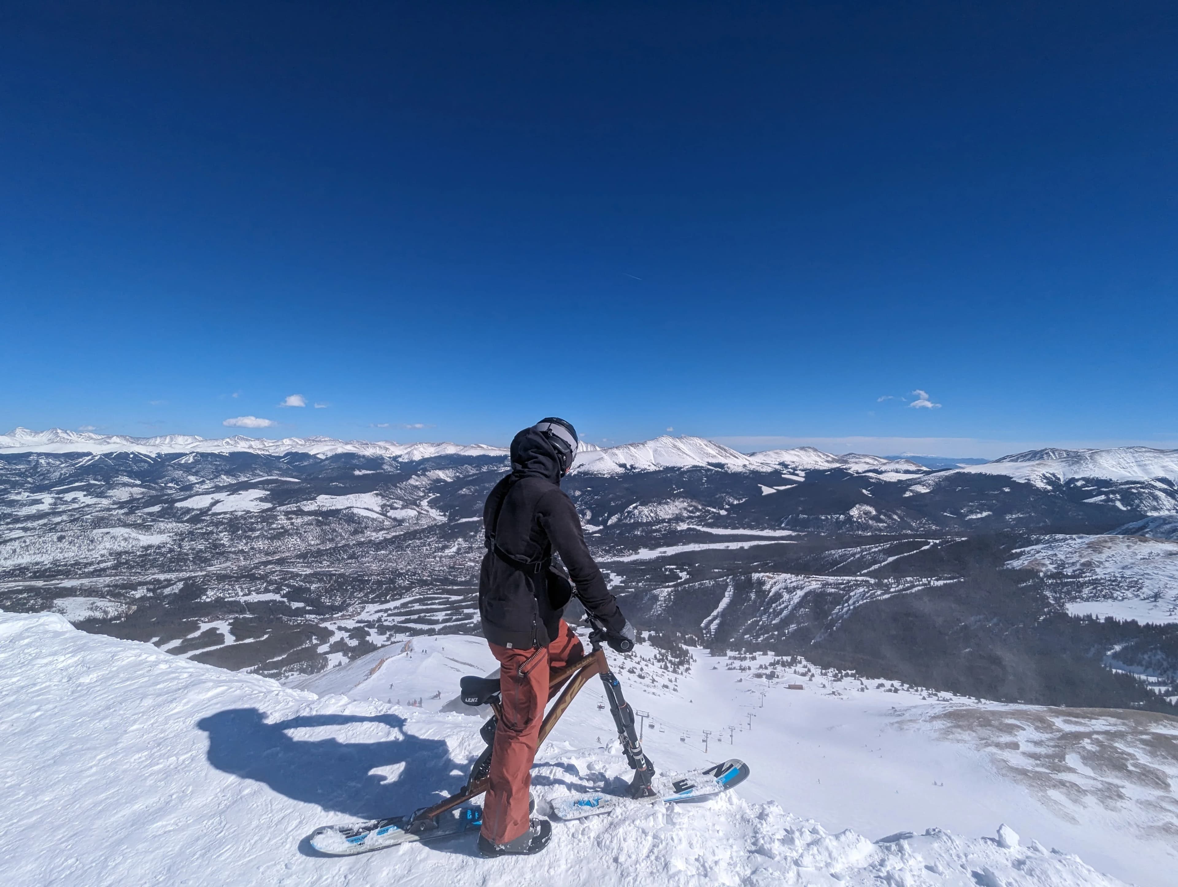Summit SkiBike demo fleet arranged outside the lodge before practice laps.